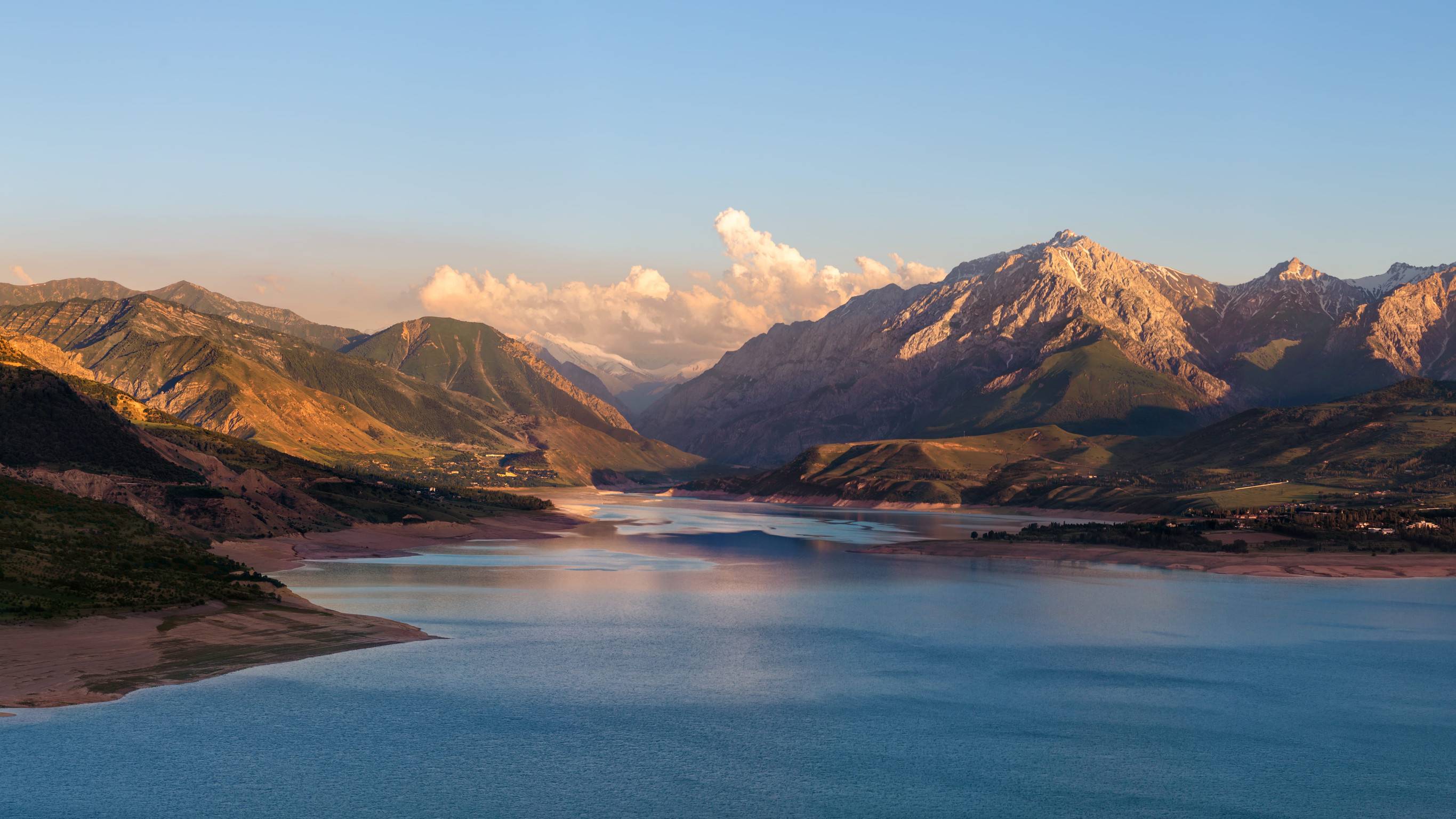 Charvak Lake With Mountains In The Background