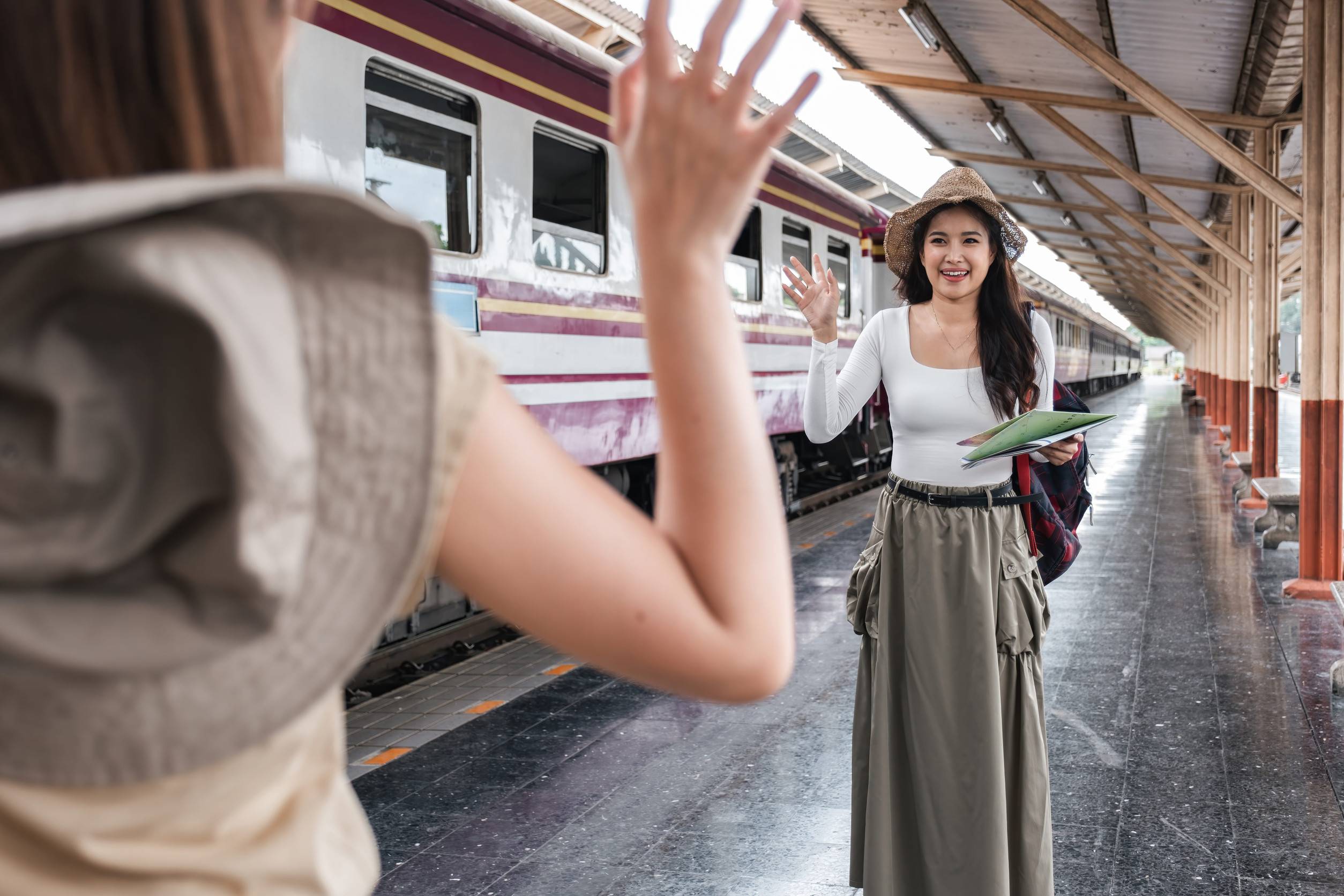 Female Travellers Meeting Up With Each Other